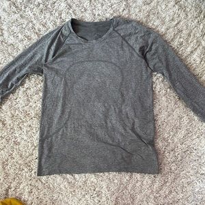 lululemon long sleeve swiftly tech top in gray.